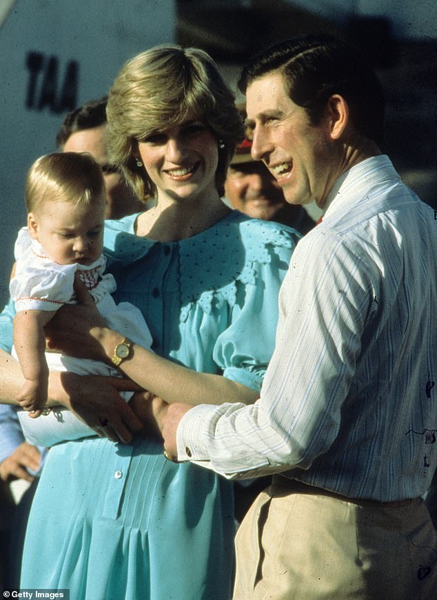 Diana carries Prince William as they arrive at Alice Springs Airport at the start of their tour in March 1983