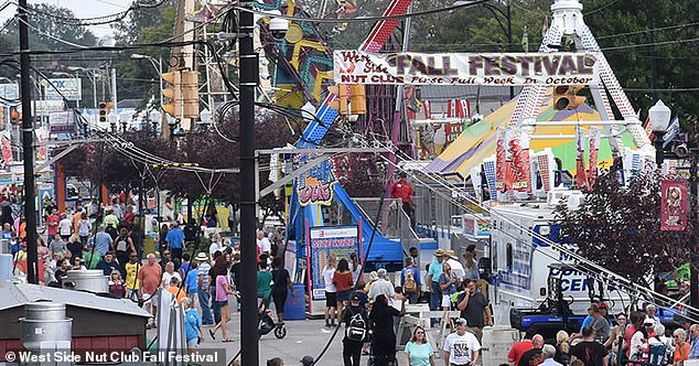 Amusement rides, parades and live performances are all features of the annual West Side Nut Club Fall Festival in Evansville, Kentucky (photo)