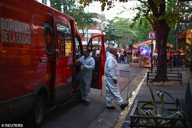 Emergency services arrive at the Casa Sur Hotel in Buenos Aires after Payne was found dead