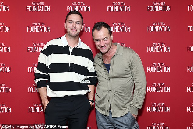 The Warm Bodies actor, who plays Bob Mathews in the thriller, beamed as the trio posed for a photo together