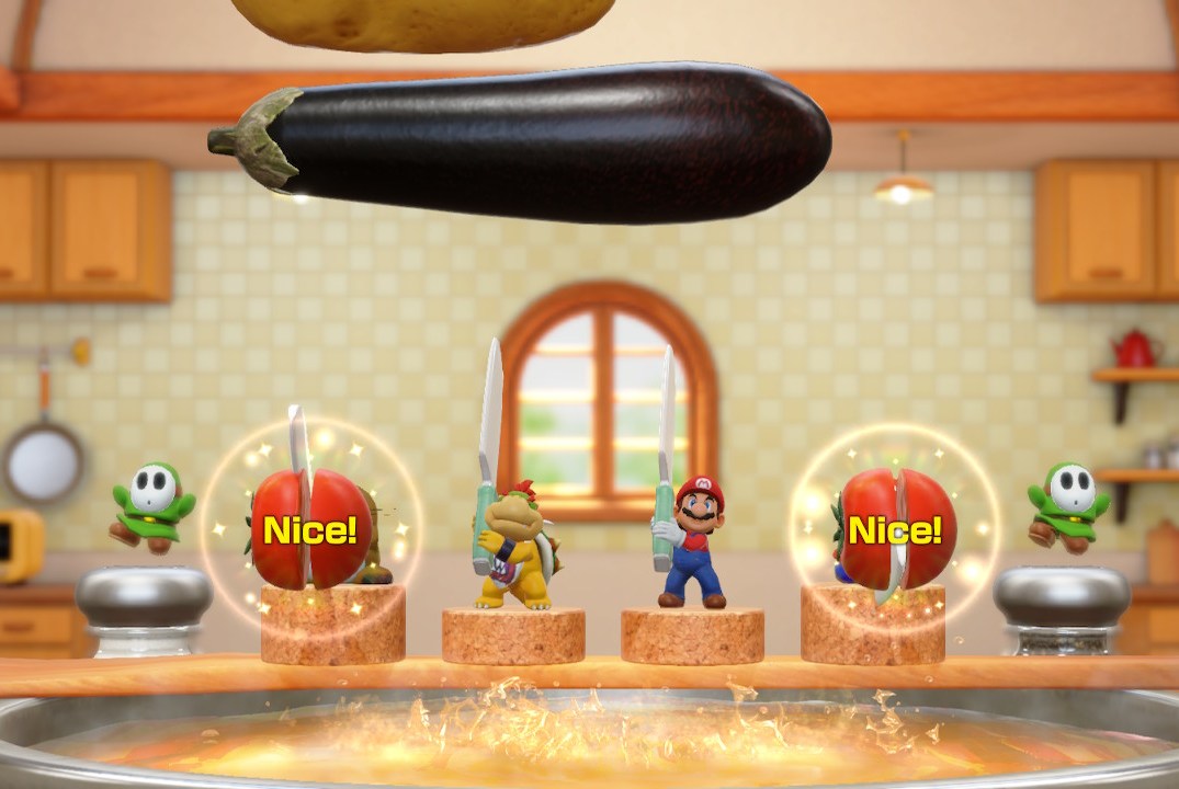 Characters from Super Mario Party Jamboree play a mini-game involving slicing vegetables