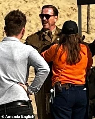 Earlier this month, Damian looked unrecognizable while filming new WWII drama Pressure Camber Sands Beach in East Sussex