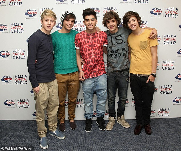 Scott joked that he sometimes felt like the sixth member of One Direction because he was with them so often during their heyday when he presented on BBC Radio 1 (pictured together in 2011).