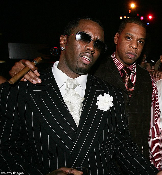 Payne also recalled being pushed by one of Jay-Z's bodyguards after he leaned over to talk to him. Jay-Z and Diddy are pictured in 2004