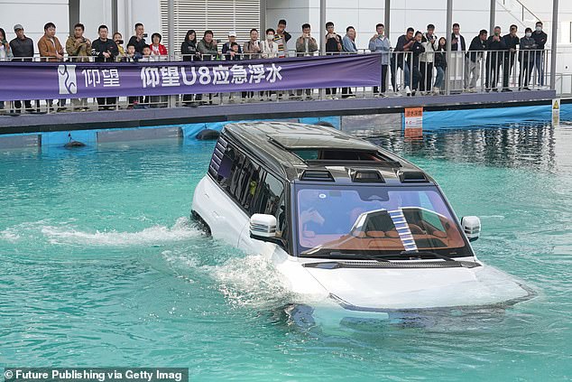 The U8, pictured during a demonstration in China, can float for half an hour and travel at a speed of 3 km/h in the water. The U8's viral 'tank turn' maneuver can even be performed while floating