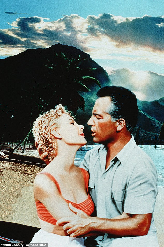 The star is seen with Rossano Brazzi in the South Pacific in 1958