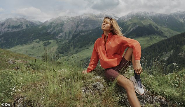 The actress also modeled a fall look when she donned an orange quarter-zip waterproof jacket as part of the campaign and completed the look with brown cycling shorts.