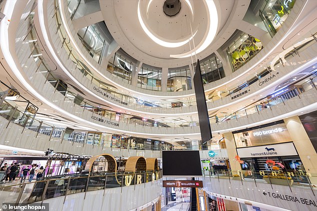 With the addition of hand sanitisers and sprays, indoor spaces have hardly been the same since the Covid pandemic. In the photo a shopping center in Hong Kong