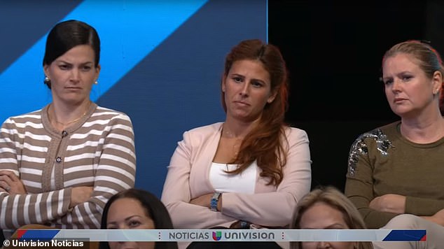 A camera panning around the audience captured stern reactions as Trump gave his response