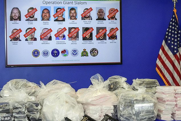 During a demonstration, prosecutors showed off the items authorities seized in the alleged drug trafficking operation, including more than a ton of cocaine and dozens of rounds of ammunition and more than $3 million.