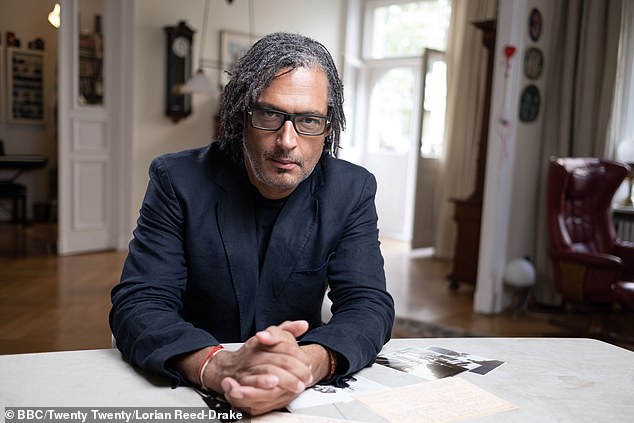 David Olusoga in one of the apartments of the building on Pfalzburger Strasse, Berlin - the one with 'more interesting inhabitants'