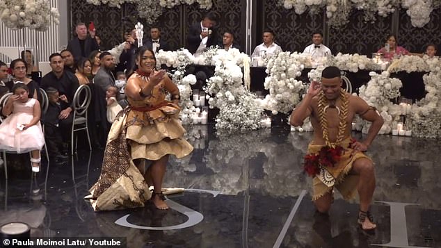 Crichton and Leona perform traditional Samoan dances at the reception after their recent wedding