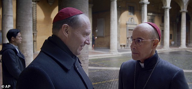 Ralph Fiennes as Cardinal Lawrence, left, and Stanley Tucci as Cardinal Bellini in a scene from Conclave