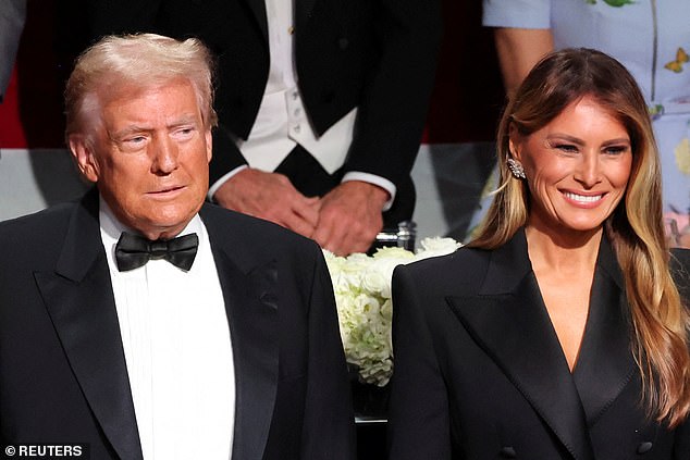 Donald and Melania sat together at dinner, both wearing similar tuxedo jackets