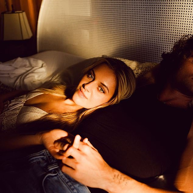 The singer also promoted the new clip on her Instagram, sharing a photo of her and Chase in bed