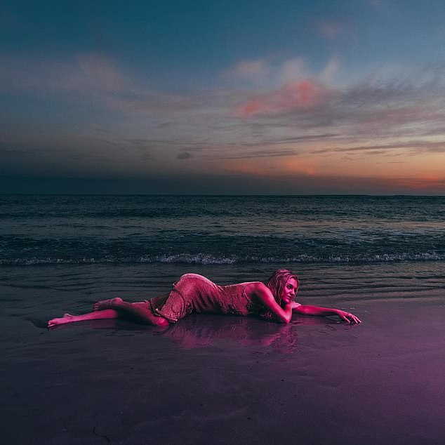 She also shared a picturesque image of her lying on the beach