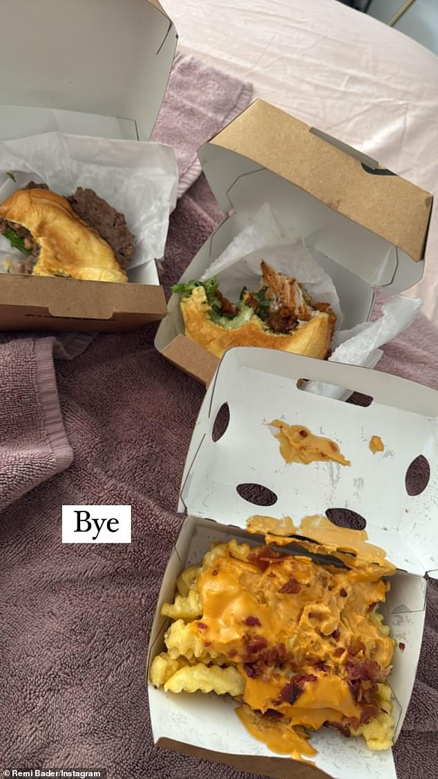 But on Wednesday, Remi proudly installed a hangover of nacho fries and two partially eaten burgers with the caption: 'Bye'