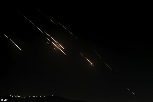 Missiles launched from Iran towards Israel are seen in the West Bank city of Nablus on Tuesday, October 1, 2024