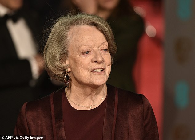 British actress Maggie Smith poses as she arrives for the 201 BAFTA Awards