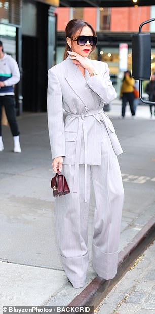 The fashion designer packed her essentials into a maroon leather bag, which she paired with her shoes and accessorized with gold jewelry