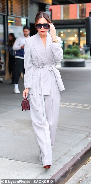 The fashion designer packed her essentials into a maroon leather bag, which she paired with her shoes and accessorized with gold jewelry