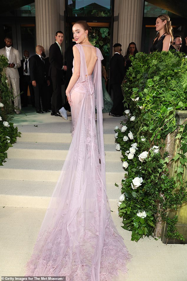 Victoria reached new heights in May when Bridgerton star Phoebe Dynevor (pictured in the dress) became the first to wear a custom Victoria Beckham dress to the Met Gala