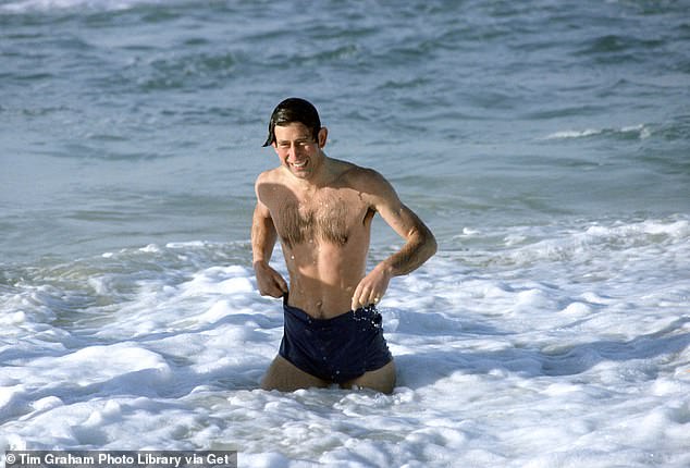 Charles enjoys a dip in the surf at Bondi Beach during his tour of Australia in 1981