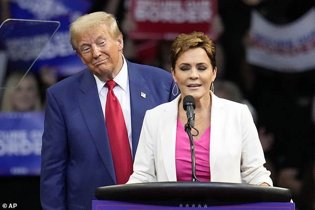 Gallego's Senate opponent Kari Lake (pictured at a rally with Donald Trump on Sunday) drew up Gallego's divorce papers before they were unsealed, saying 