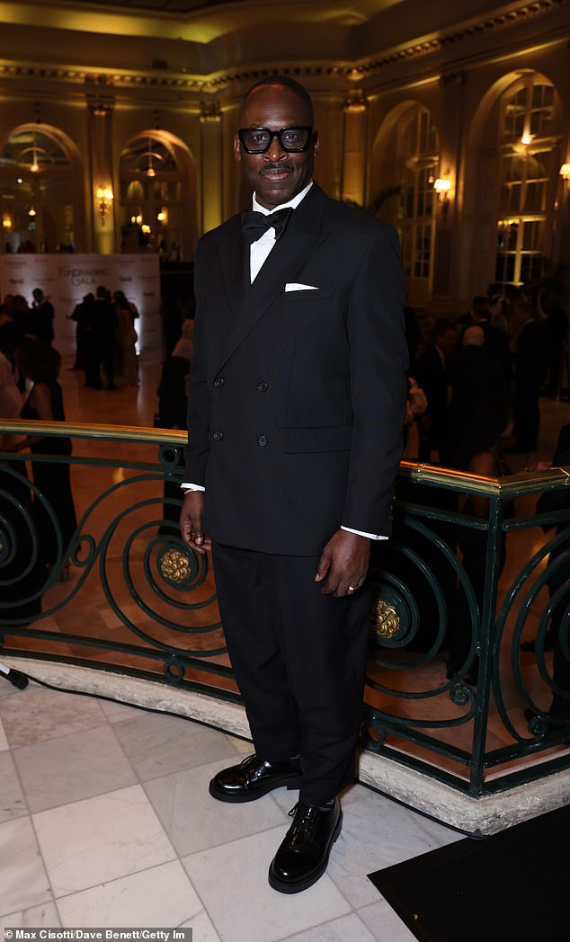 Film director Simon Frederick looked smart in a classic black tuxedo