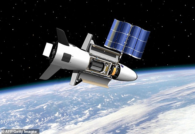 The artist's rendering above shows what the spaceplane – which uses an onboard propulsion system – might look like as it orbits Earth