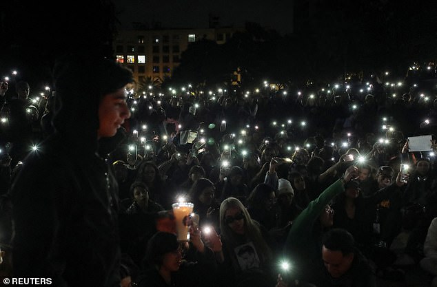 One Direction fans gather to pay tribute to Liam Payne at the Monument of the Revolution in Mexico City