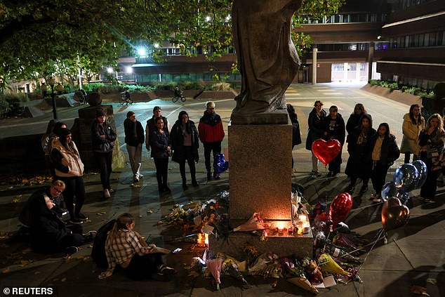 Mourners line up around the statue of Lady Wulfrun this evening to mourn Liam Payne