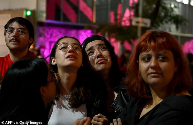 Emotional fans pictured outside the Casa Sur Palmero hotel