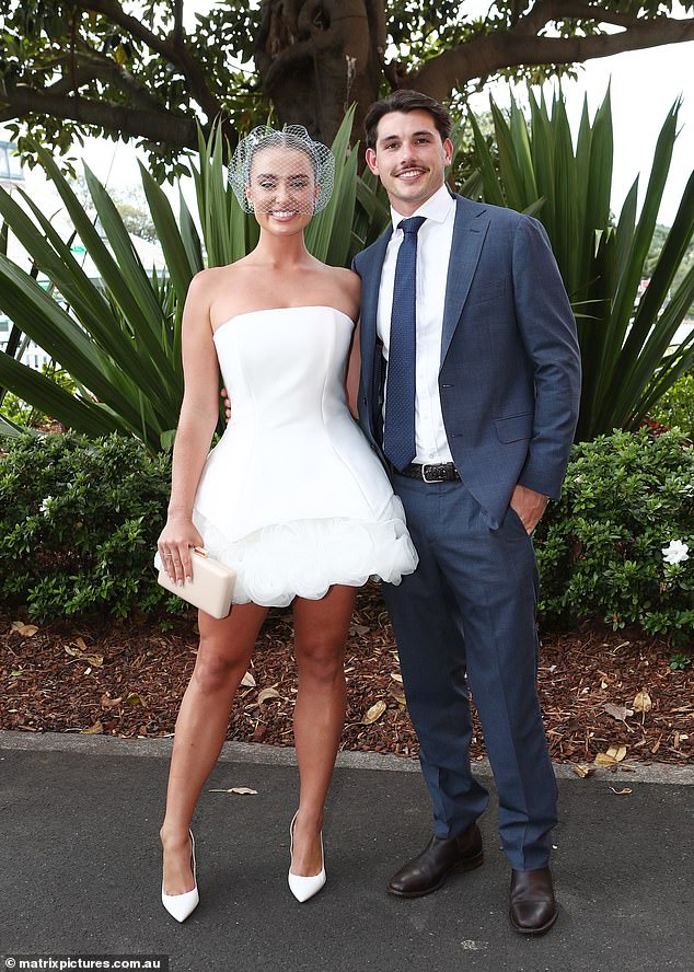 She posed next to her new cotton heir Wilson Statham, who she was first linked to earlier this year