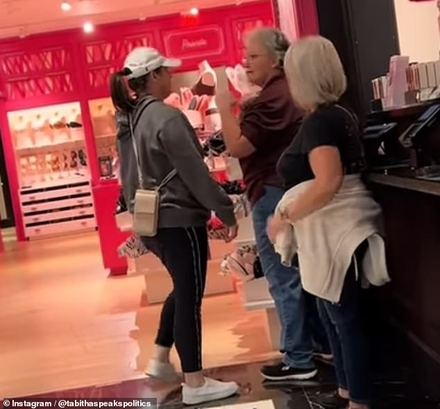 After the Karen, left, was pushed to the ground, she returned to the fists of an older lady