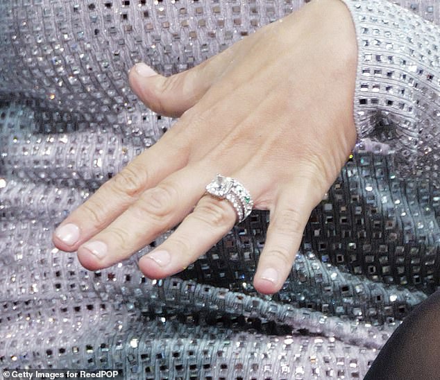 During the festivities, she wore a dazzling silver wedding ring as well as her engagement ring