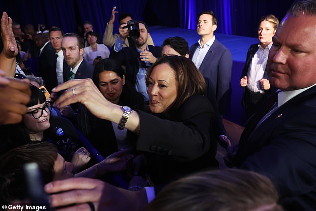 Democratic presidential candidate Vice President Kamala Harris greets his supporters as she campaigns in a key battleground state of Michigan on Friday in Waterford, Michigan