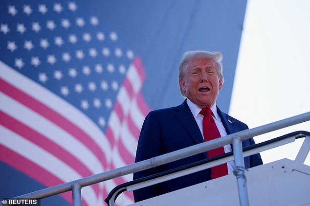 Republican presidential candidate Donald Trump arrives on Friday on 'Trump Force One' at Detroit Metropolitan Wayne County Airport, in Detroit, Michigan