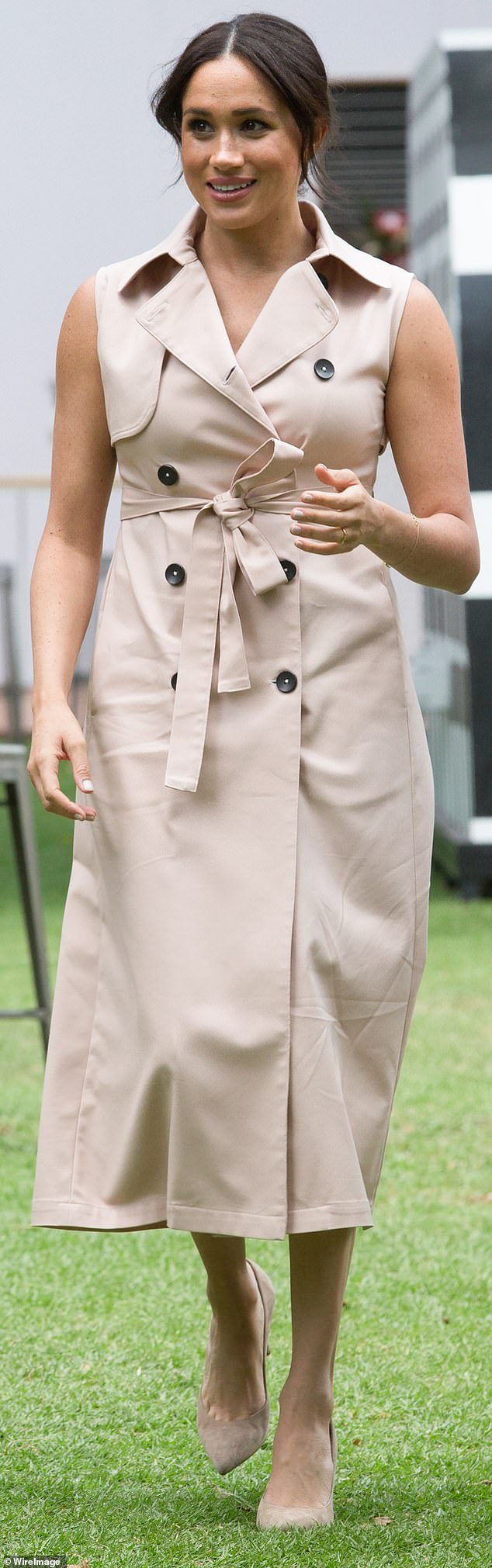 The Duchess wore this sleeveless trench dress during her interview with Tom Bradby in South Africa in October 2019