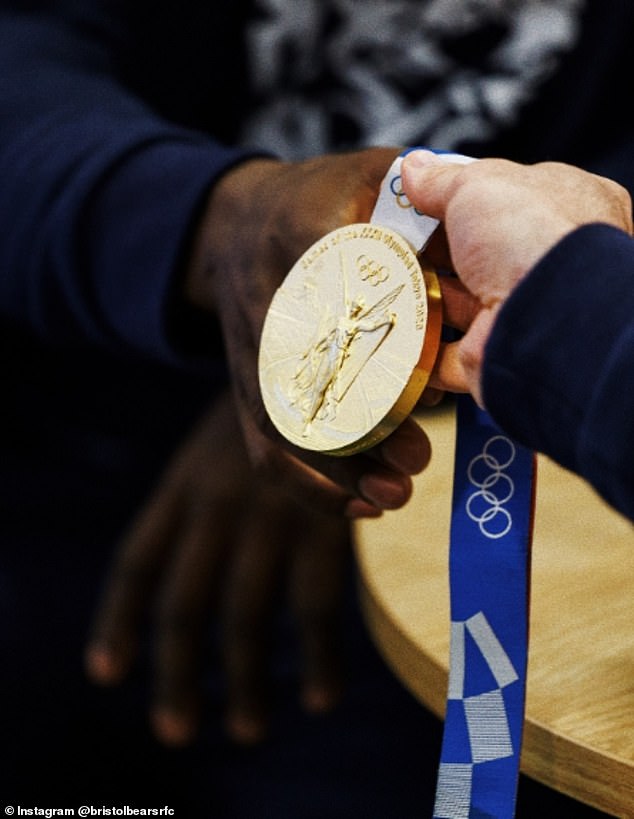 He showed off one of his Olympic gold medals and gave a speech to the players in the state-of-the-art facilities