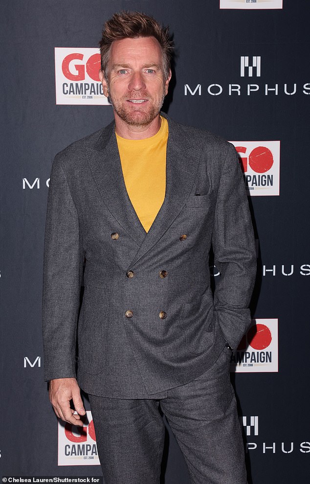 The Star Wars actor, who is an official ambassador for the nonprofit, stepped out to the fundraising event at The London Rooftop in West Hollywood looking sharp in a gray double-breasted suit that he paired with a gold top and brown leather shoes.