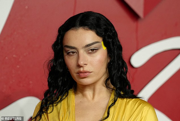 The singer has also been pictured wearing face tape to create a snatched look on the red carpet, at the December 2023 Fashion Awards in London. The singer wore neon yellow tape on her temples to raise her eyebrows