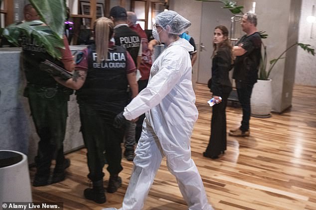 Police in the hotel reception of the Casa Sur Hotel in Buenos Aires after Liam Payne fell