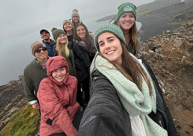 Annaliese and Lauren with their solo travel group, enjoying the wilderness of Iceland