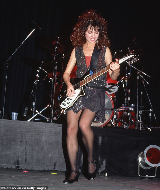 She is Susanna Hoffs from The Bangles. Hoffs sang some of the group's biggest hits, including Manic Monday and Walk Like An Egyptian; pictured in 1986