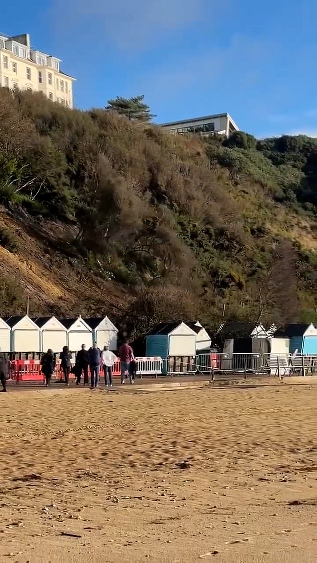 The piece of dirt was caught on camera sliding down the cliff Saturday morning