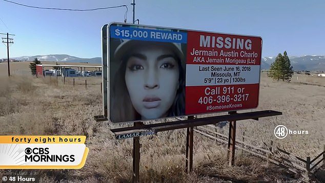 A billboard shows a photo of missing Jermain Austin Charlo with a $15,000 reward