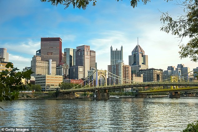 The city also boasts a thriving arts and culture scene and outdoor adventures galore – from biking to kayaking in historic Point State Park. (Image: Pittsburgh skyline with the famous 'Rachel Carson Bridge', several skyscrapers and the Allegheny River waterfront)