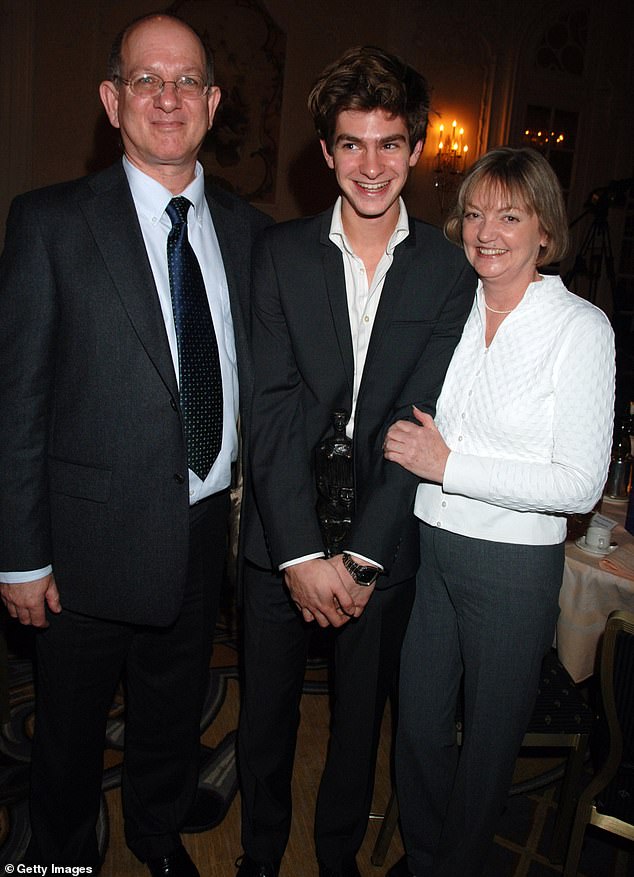 Andrew is pictured with his parents Lynn and Richard at the Evening Standard Theater Awards in 2006; Lynn died in England in 2019 from pancreatic cancer