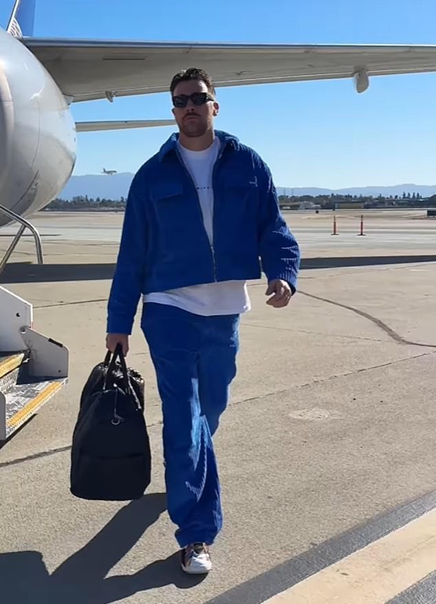 Kelce wore a tight blue corduroy tracksuit as he left the team plane